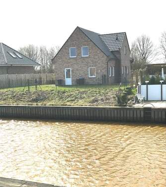 Ansicht Wasserseite - Einfamilienhaus mit 129,60 m² in Rhede (Ems) zur Miete
