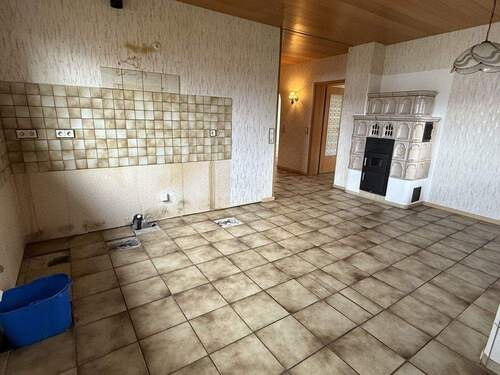 Wohnküche EG mit Kachelofen - 