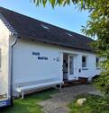 Haus Martha Eingang - 1 Zimmer Mehrfamilienhaus, Wohnhaus zum Kaufen in Wangerooge