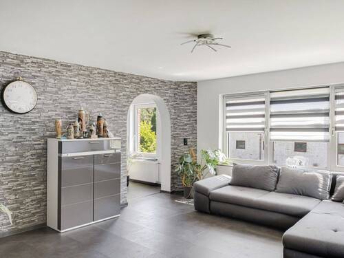 Wohnzimmer mit Blick Richtung Küche - Einfamilienhaus mit 167,50 m² in Holzdorf / Söby zum Kaufen