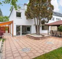 Aigner - Seltene Gelegenheit: Reiheneckhaus mit modernem Anbau & großem Garten in Taufkirchen