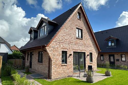 Bild 2 - 5 Zimmer Einfamilienhaus zum Kaufen in Sylt-Ost / Tinnum