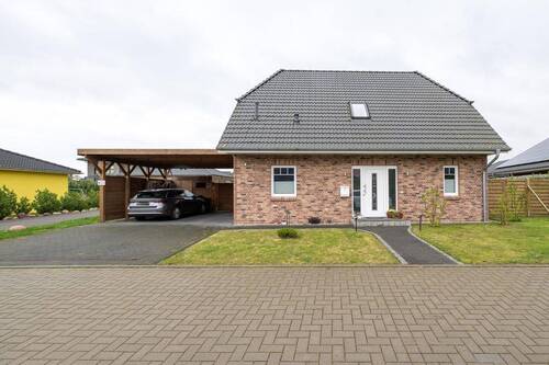 Straßenansicht - Einfamilienhaus mit 136,10 m&sup2; in Damp zum Kaufen