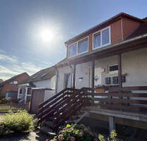 Charmante Doppelhaushälfte mit zwei Wohneinheiten und schönem Garten in Göttingen-Holtensen