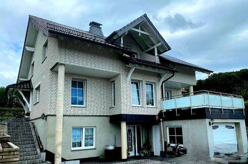 Bild 1 - Topausgestattetes Architektenhaus Wohlfühlambiente hochwertige Ausstattung Terrassen Loggia Garage