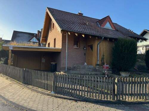 Hausansicht - 5 Zimmer Einfamilienhaus zum Kaufen in Baunatal