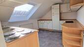mit EBK - Gemütliche Dachgeschosswohnung mit Einbauküche