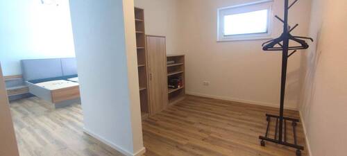 Schlafzimmer 1 mit zusätzlichem Bereich - 