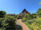 Haus und Gartenansicht Richtung Balkon - 6 Zimmer Einfamilienhaus zum Kaufen in Vögelsen