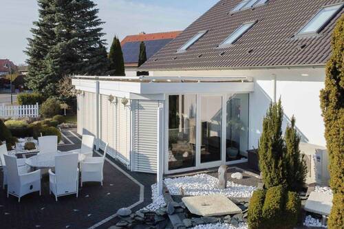 Ansicht Terrasse & Wintergarten - 6 Zimmer Einfamilienhaus in Schwedt/Oder