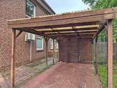 Carport - Geräteraum - Doppelhaushälfte mit 111,00 m² in Saterland zum Kaufen