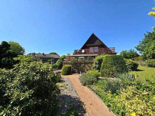 Haus und Gartenansicht Südansicht - 6 Zimmer Mehrfamilienhaus, Wohnhaus zum Kaufen in Vögelsen