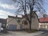 Seitliche Straßenansicht - Einfamilienhaus mit 100,00 m&sup2; in Heilbad Heiligenstadt zum Kaufen
