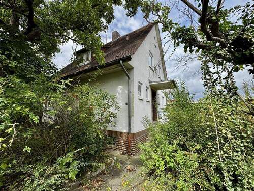 Bild1 - Einfamilienhaus mit ehem. Praxis auf einem 1.304 m² großen Grundstück in Kassel-Oberzwehren!