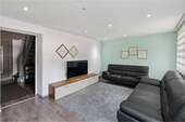 Wohnzimmer - 7 Zimmer Einfamilienhaus zum Kaufen in Illertissen/Tifenbach