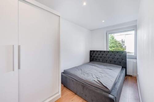 Schlafzimmer - 2 Zimmer Etagenwohnung in München