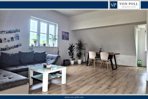 Bild 1 - Gemütliche Wohnung mit großem Wohnzimmer und Balkon