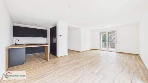 Wohn-Esszimmer mit Küche - GRENZE LUXEMBURG: NEUE WOHNUNG MIT BALKON UND 33 M² GARAGE!