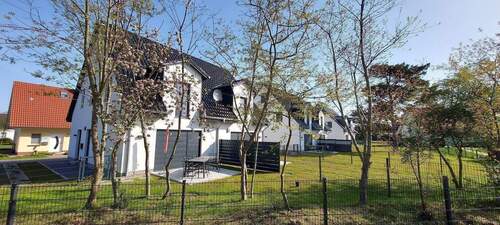 Außenansicht - +++Meerluft schnuppern+++Ruhig gelegene Ferienwohnung in Form einer Haushälfte in Fuhlendorf, an der Ostsee zu verkaufen!