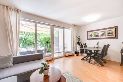 Wohnbereich - AIGNER - Zentral wohnen, grün genießen: 2-Zimmer-Wohnung mit 2 Terrassen