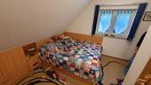 Raum im Dachboden - 
