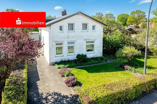 Vorderansicht 05 - Kleines, stark modernisierungsbedürftiges Einfamilienhaus mit großem Grundstück in zentraler Wohnlage von Elmshorn