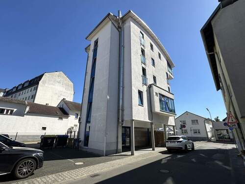 Hausansicht - 1 Zimmer Mehrfamilienhaus, Wohnhaus zum Kaufen in Langen