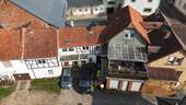 Mehrfamilienhaus mit mehreren Einheiten in Hasselroth - Mehrfamilienhaus mit 307 m² Wohnfläche, 2 Wohnungen, 2 Gewerbeeinheiten und 755 m² Grundstück