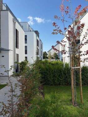 Außenansicht - SCHNELL EINZIEHEN UND GLEICH WOHLFÜHLEN: Sonnige 4-Zi-Whg. mit gr. Balkon! Sie erhalten sogar noch den KfW-Zuschuss in Höhe von 26.250€!