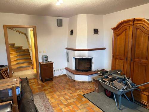 Zimmer im UG mit Holzofen - 