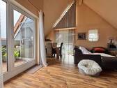 Wohn- und Essbereich - Außergewöhnliche Drei-Zimmerwohnung mit Loggia und Blick über Viernheim
