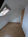 Zimmer im Dachgeschoss - 