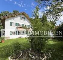 AIGNER - Gepflegtes Mehrfamilienhaus in ruhiger Seitenstraße in Ottobrunn