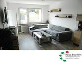 gemütlicher Wohnbereich - Sanierte und komplett renovierte Etagenwohnung in stadtnahem Haus mit Tageslichtbad und Loggia, ca.76m².