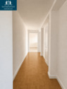 Flur mit Blick zum Wohnzimmer (KI optimiert) - Etagenwohnung mit 73,70 m&sup2; in Magdeburg zur Miete