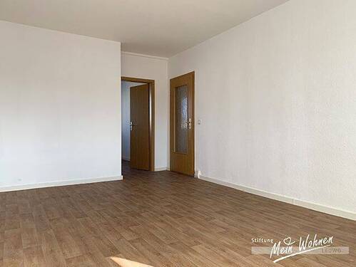 Wohnzimmer mit Balkon - 