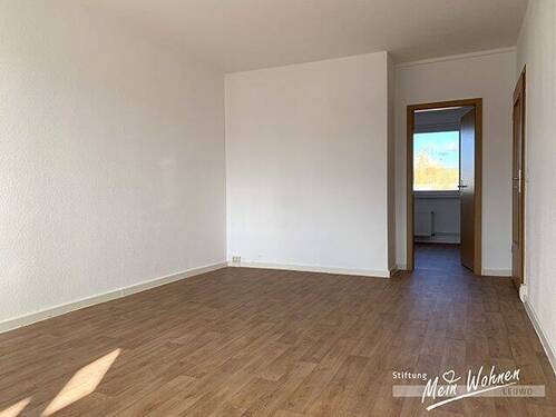 Wohnzimmer mit Balkon - 