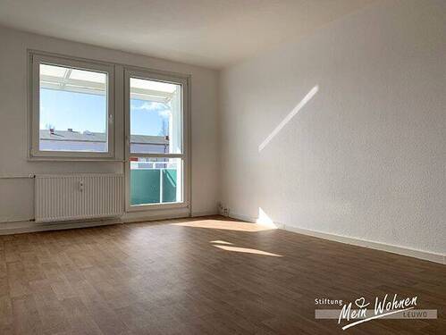 Wohnzimmer mit Balkon - 