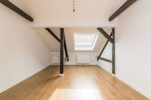 Wohnzimmer - Helle 2-Zimmer-Dachgeschosswohnung mit Wohlfühlcharakter - ideal für Singles oder Paare