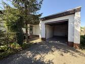 Garage und Eingang - Einfamilienhaus mit 129,00 m&sup2; in Jever zum Kaufen