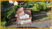 Luftbild - Einfamilienhaus mit 153,00 m&sup2; in Schrecksbach zum Kaufen