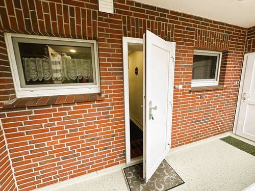 Eingangsstür - Etagenwohnung mit 47,00 m² in Wangerland zum Kaufen