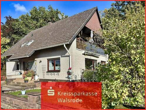 Titelfoto - Geräumiges Zweifamilienhaus mit großem Grundstück in schöner Waldrandlage von Walsrode-Düshorn
