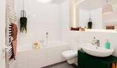 Badzimmer mit Badewanne und Waschmaschinenanschluss - 