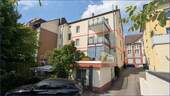 Rückansicht - Moderne Dreiraumwohnung mit Pkw-Stellplatz in saniertem und gepflegtem Altbau