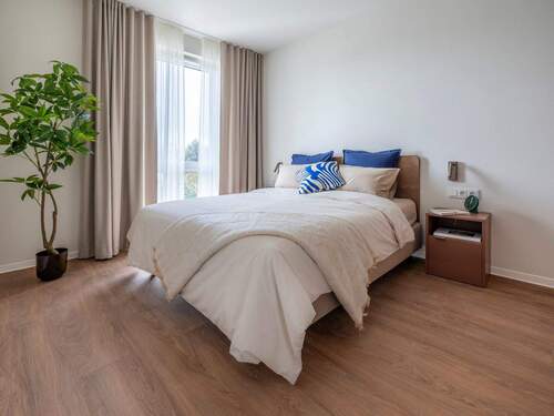 Schlafzimmer - 2-Zimmer Standard mit exklusiven Gemeinschaftsflächen: Padelplatz, Fitness, Dachterrasse & mehr