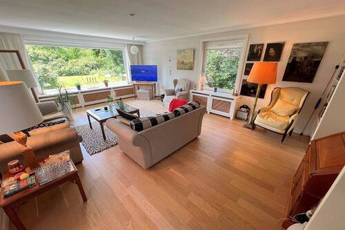 Helles Wohnzimmer mit Gartenblick - Bungalow mit 213,00 m² in Wyk auf Föhr zum Kaufen