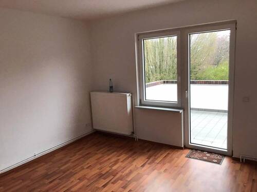 Wohnzimmer - Mehrfamilienhaus, Wohnhaus in Wilhelmshaven