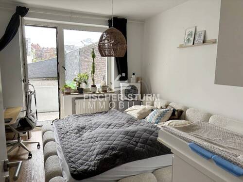 Schlafzimmer mit Balkon - Etagenwohnung mit 58,10 m&sup2; in Düsseldorf zur Miete