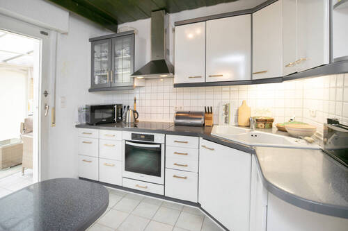 Küche mit Zugang zum Wintergarten - Einfamilienhaus mit 98,00 m² in Rödermark / Urberach zum Kaufen